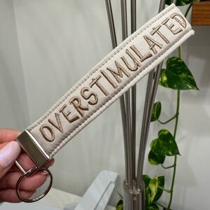 Overstimulated keychain lanyard wristlet